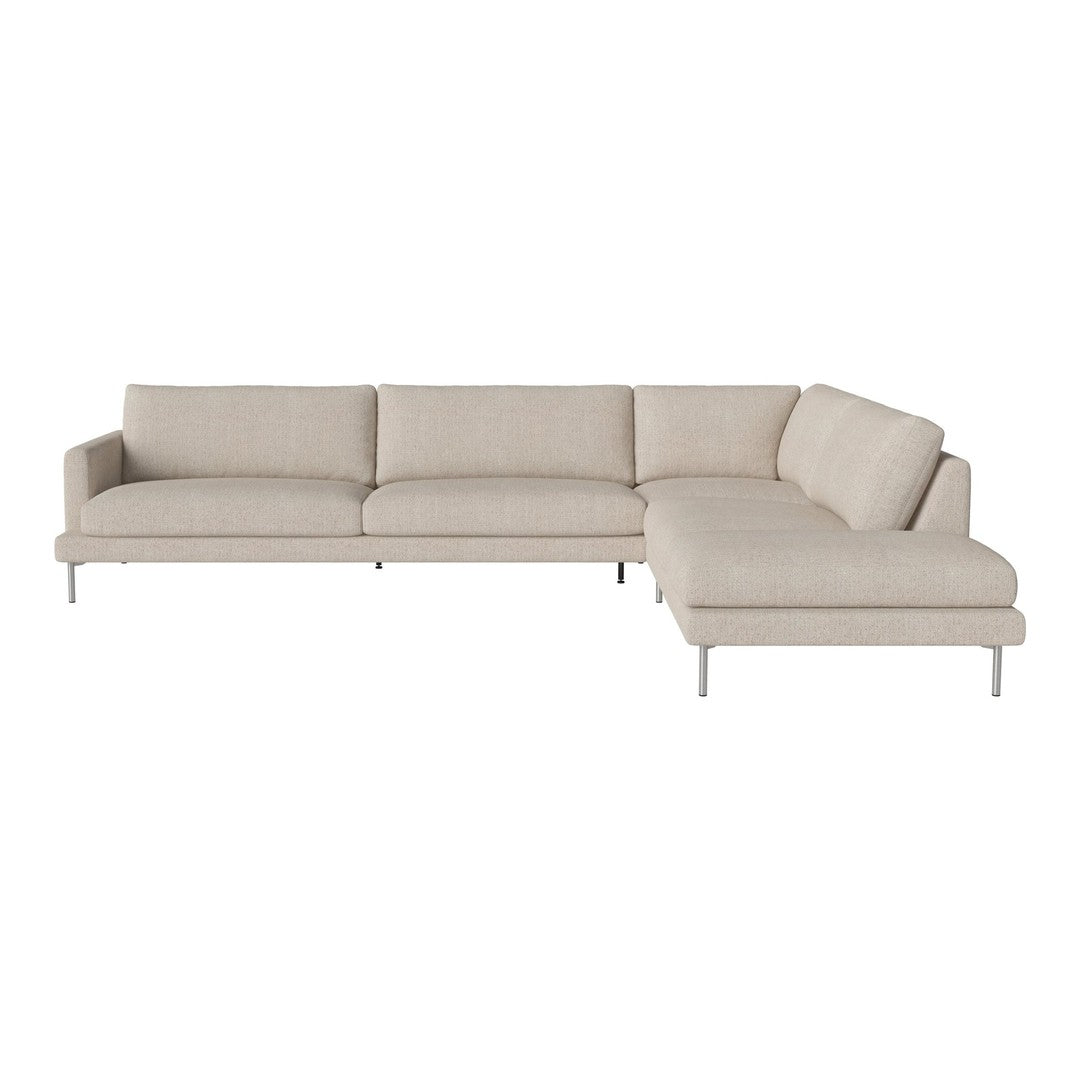Beige sectional sofa with sleek lines and soft fabric, featuring modern minimalist design. Ideal for contemporary decor.