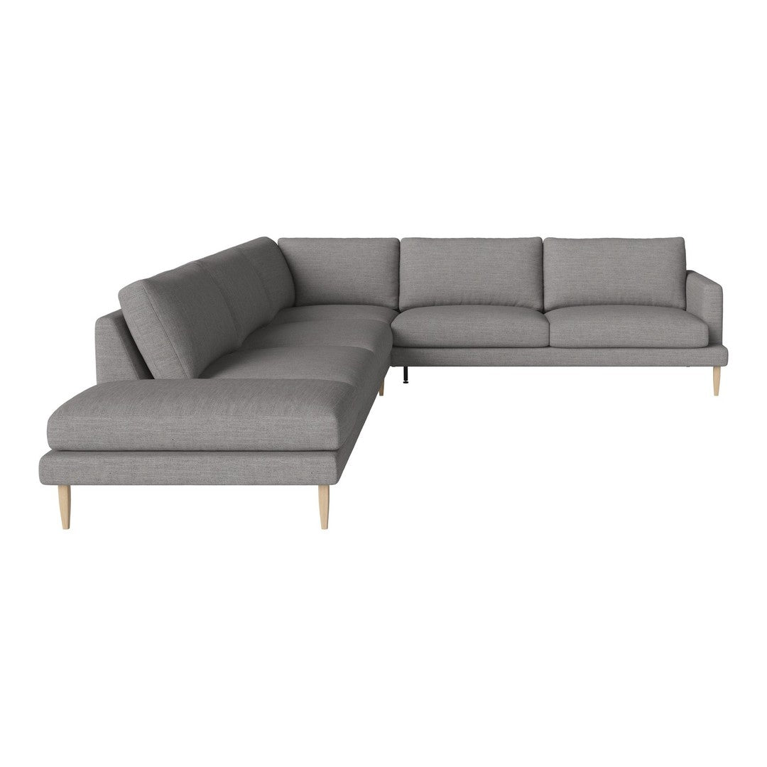 Gray L-shaped sectional sofa with a minimalist design and light wood legs, perfect for modern living spaces.