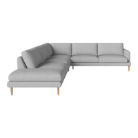 Light gray sectional sofa with a clean, modern design and wooden legs, perfect for contemporary living spaces.