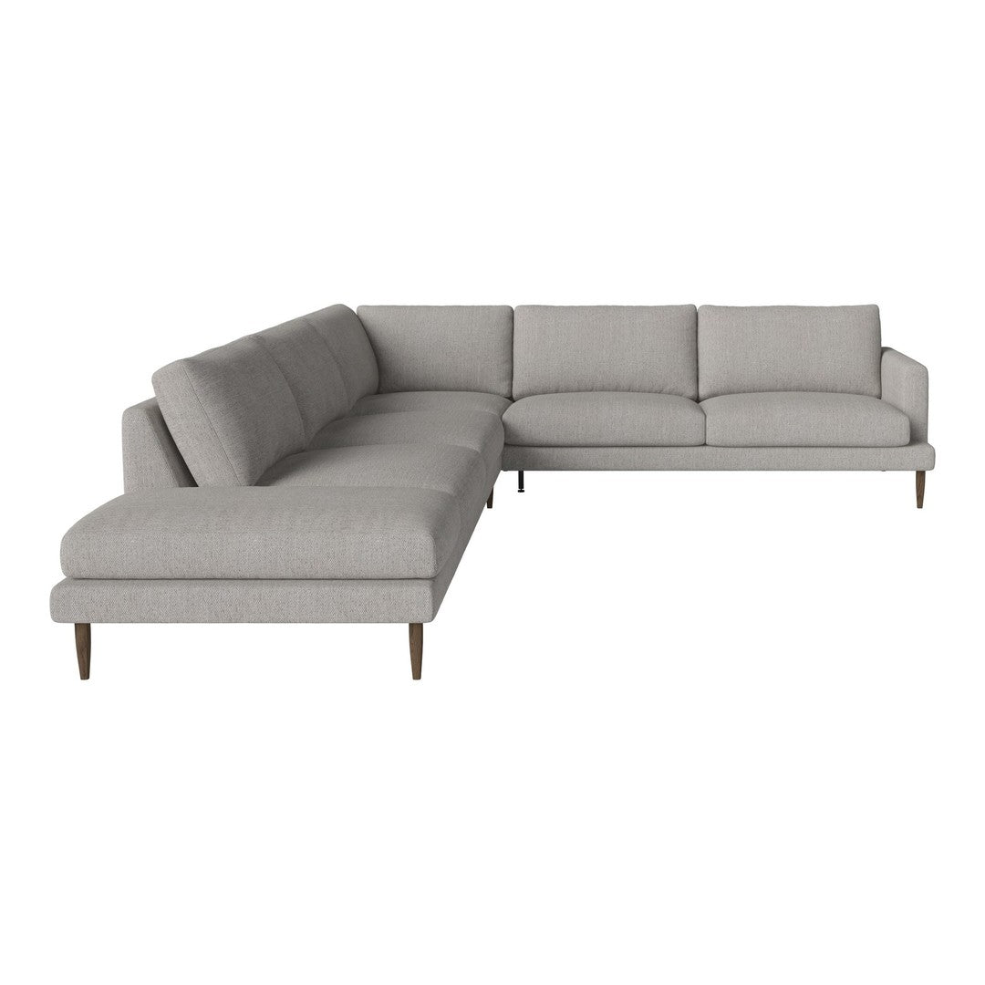 Light gray sectional sofa with a sleek design and subtle texture, featuring angled wooden legs for modern appeal.