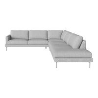 Light gray sectional sofa with clean lines and minimalist design, featuring plush cushions and sleek metallic legs.