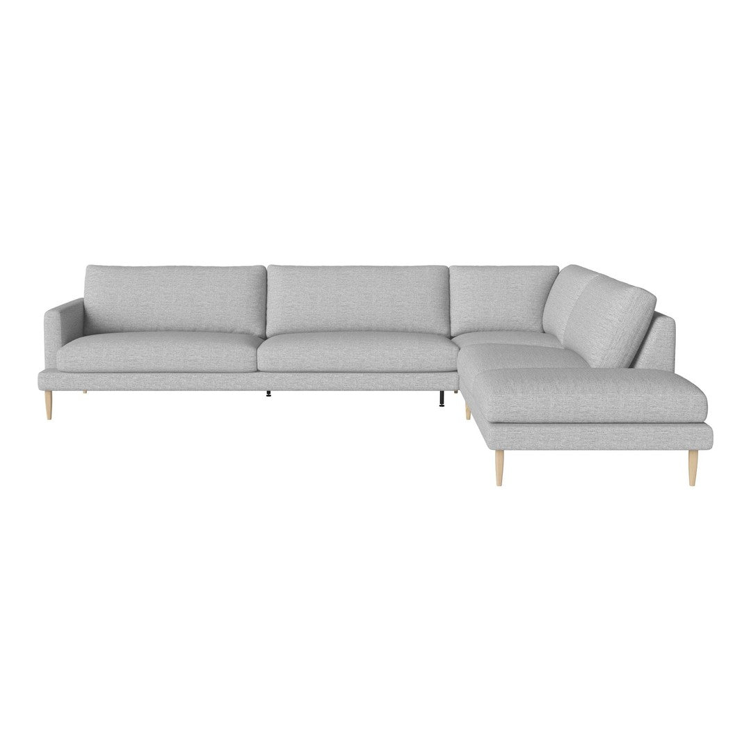 Light gray sectional sofa with a minimalist design and subtle texture, featuring natural wood legs.