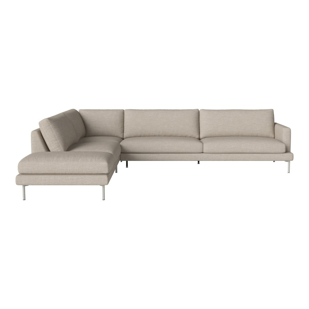 L-shaped sofa in soft beige upholstery with minimalist design and smooth, clean lines. Perfect for modern living rooms.
