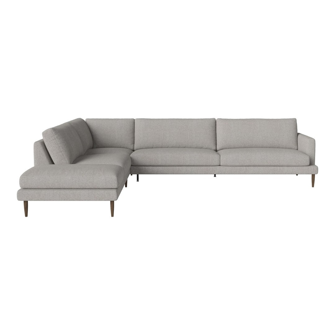 Light gray sectional sofa with smooth, minimalist design and tapered wooden legs. Ideal for modern living spaces.