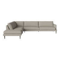 Light beige sectional sofa with a smooth, textured fabric and minimalist wooden legs. Perfect for modern decor.