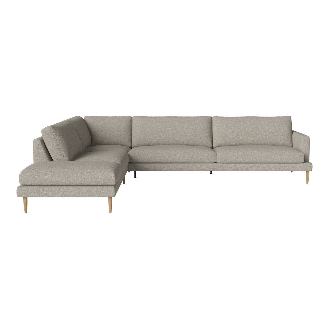 Light gray sectional sofa with clean lines and subtle texture, featuring natural wood legs. Ideal for modern decor.