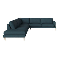 Teal fabric sectional sofa with solid cushions and light wooden legs, perfect for modern living spaces.