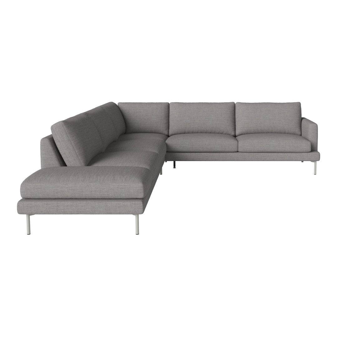 Modern gray sectional sofa with clean lines and soft cushions, featuring a minimalist design and sleek silver legs.