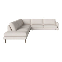 Light beige L-shaped sofa with subtle texture and sleek wooden legs, perfect for contemporary living spaces.