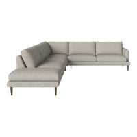 Light grey sectional sofa with a smooth, minimalist design and subtle texture. Perfect for modern living spaces.