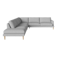 Light gray sectional sofa with a minimalist design and wooden legs, featuring a smooth, textured pattern.