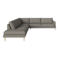 Gray sectional sofa with a modern design, featuring clean lines and subtle texture on fabric upholstery.