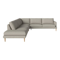 Light gray sectional sofa with a minimalist design and subtle texture, featuring wooden legs for an elegant touch.