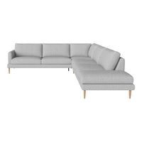 Light gray sectional sofa with clean lines and subtle texture, featuring tapered wooden legs for a modern touch.