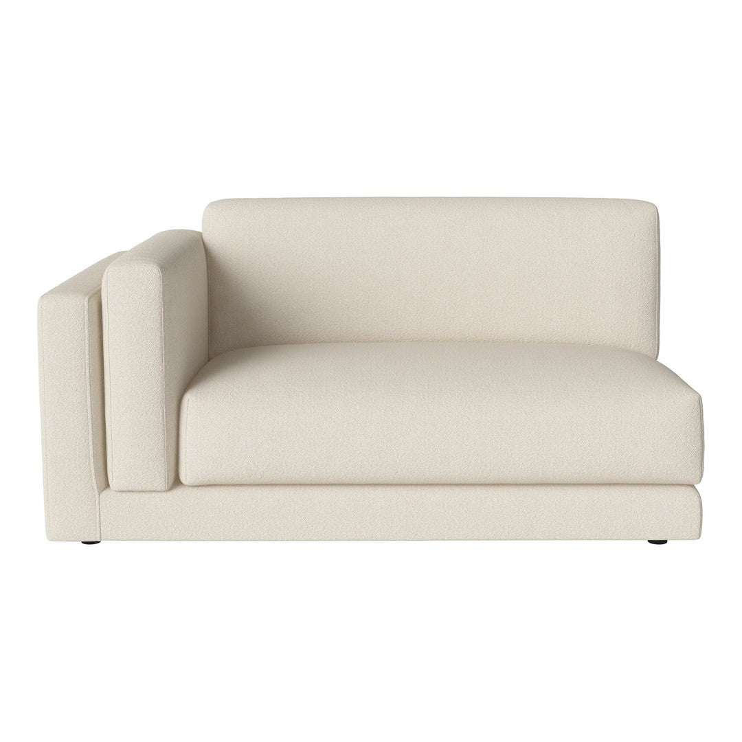 Cream-colored modern sectional sofa with clean lines and minimalist design. Ideal for contemporary living spaces.