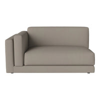 Beige modular sofa with a minimalist design and smooth upholstery, perfect for modern living spaces.
