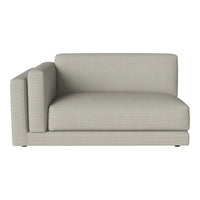 Light gray modular couch with sleek, minimalistic design and subtle texture, perfect for modern interiors.