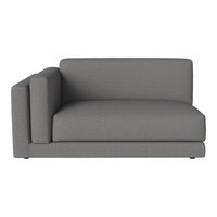 "Modern gray sectional sofa with a textured fabric and minimalist design, perfect for contemporary living spaces."