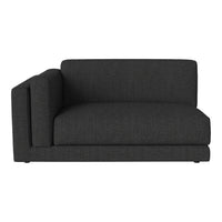 Modern dark gray couch in a simple, textured pattern for contemporary living spaces.