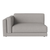 Light gray sectional sofa with solid fabric and minimalistic design, featuring clean lines and a modern aesthetic.