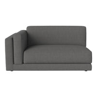 Gray upholstered corner sofa with clean lines and modern design, featuring a textured, solid color fabric.