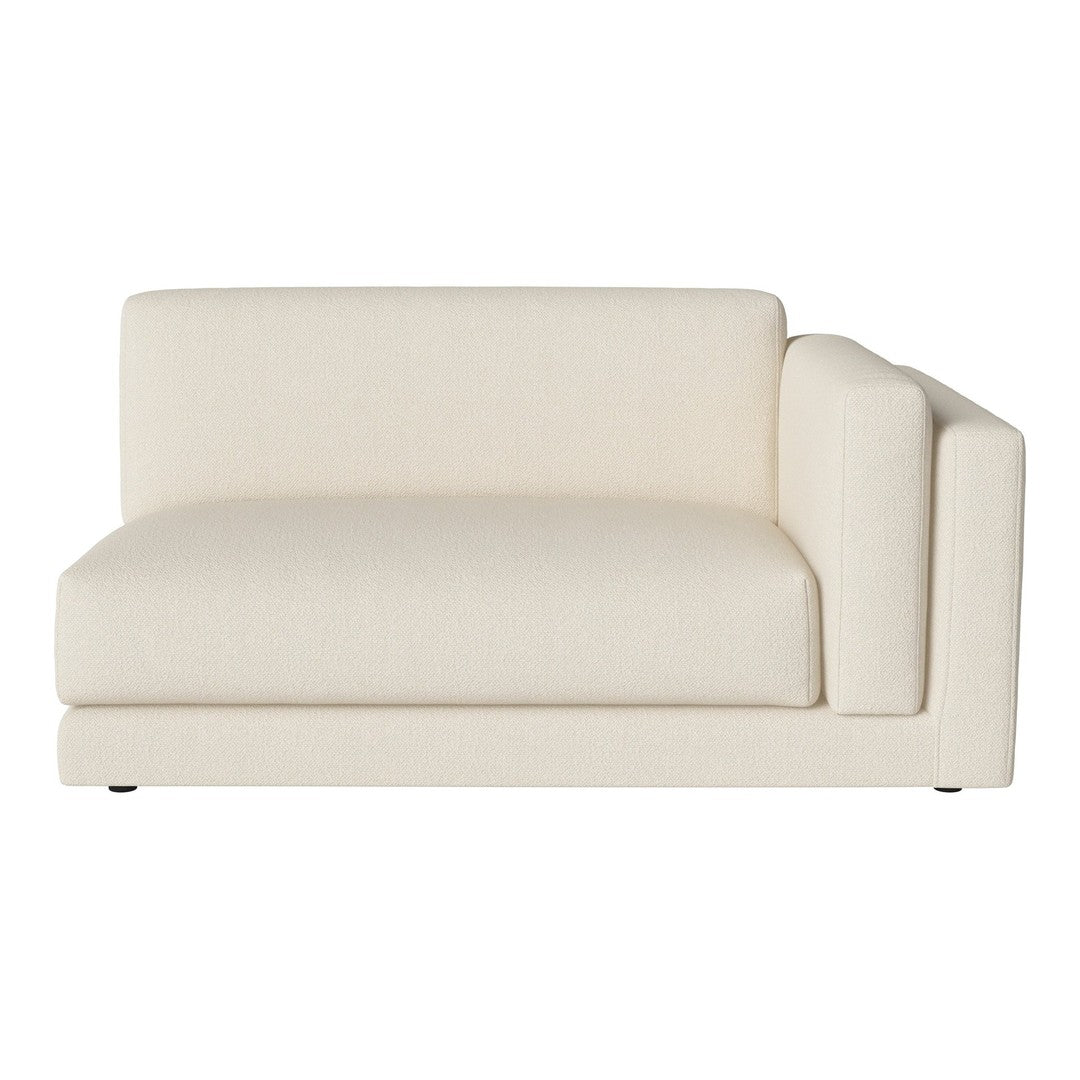 Cream-colored sofa with a sleek, modern design and minimalistic pattern, ideal for contemporary interiors.