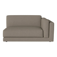 Sleek, modern sofa in a soft taupe color with a minimalist design, featuring textured upholstery.