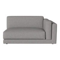 Gray corner sofa with a smooth, textured fabric and minimalist design, perfect for modern decor.