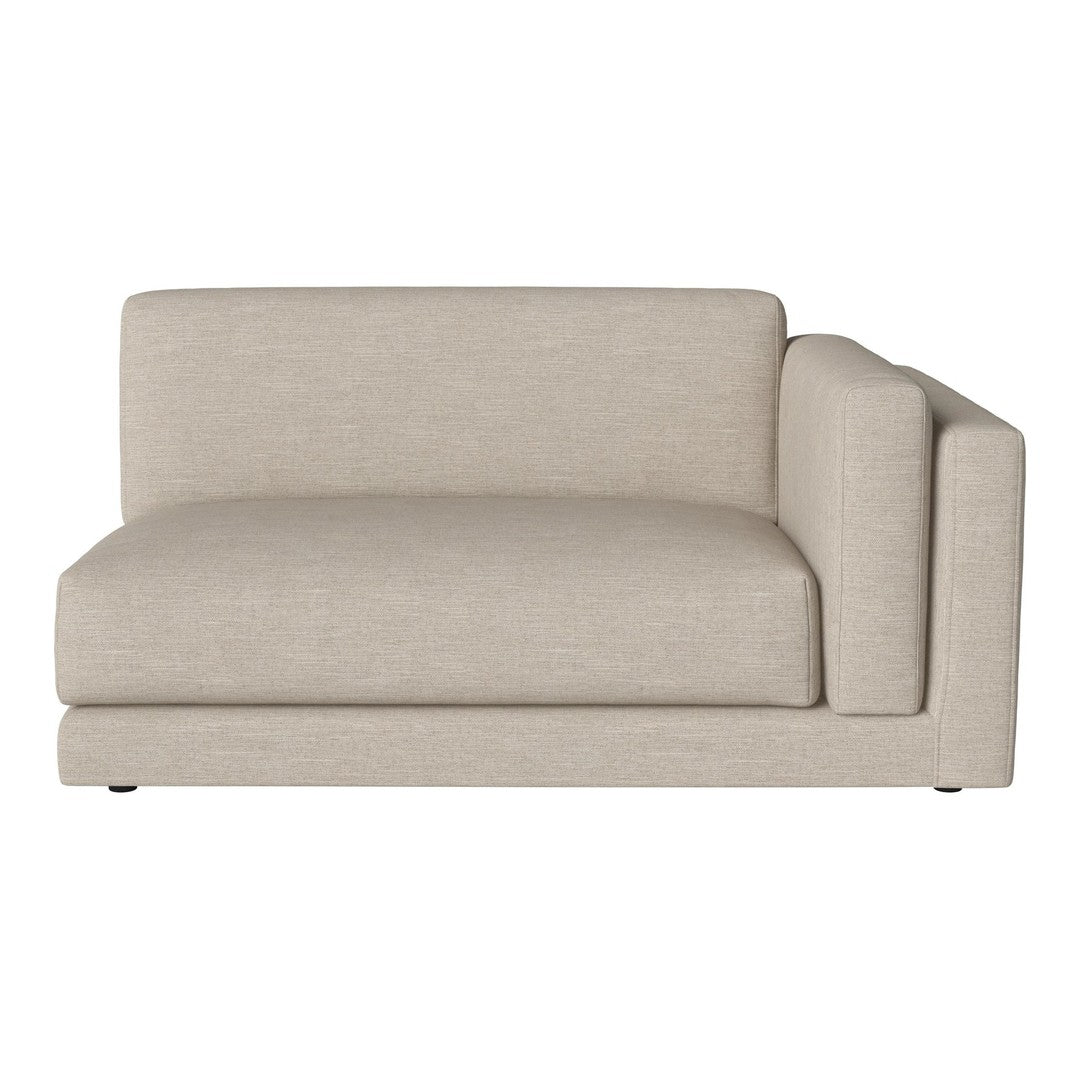 Beige fabric chaise lounge with a minimalist design and clean lines. Perfect for modern living spaces.