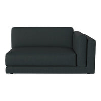 Dark gray upholstered sectional sofa with a textured fabric and modern design. Perfect for contemporary interiors.