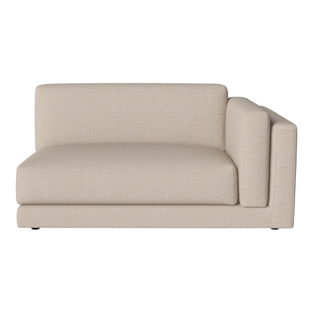 Beige upholstered sectional sofa with a smooth, modern design and clean lines, perfect for any living space.