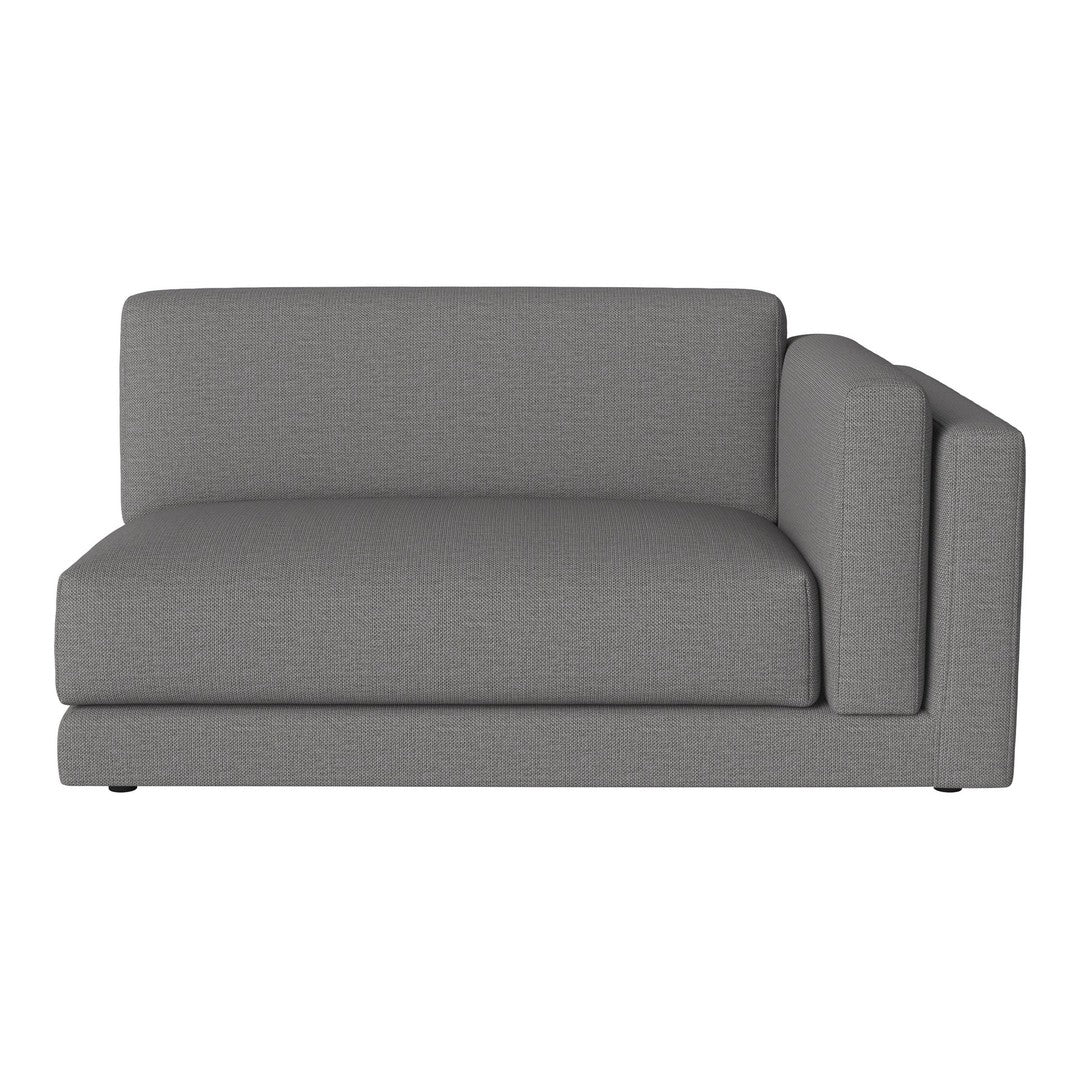 Gray upholstered sectional sofa with clean lines and a contemporary design, featuring a subtle textured pattern.