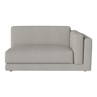 Gray upholstered sectional sofa with a minimalist design and smooth, textured fabric. Perfect for modern interiors.