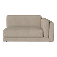 Beige upholstered sofa with a subtle textured pattern and a modern, minimalist design. Perfect for any decor style.