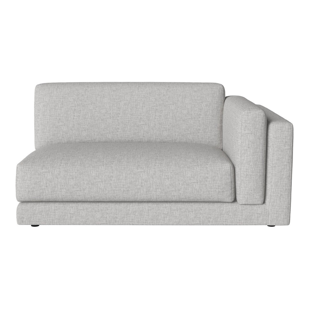 Light gray textured fabric sectional sofa with clean lines and minimalistic design. Perfect for modern interiors.