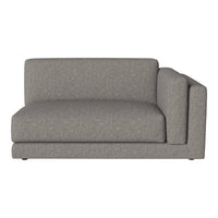 Gray upholstered sectional sofa with a clean, minimal design and subtle texture. Perfect for modern living spaces.