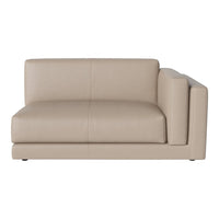 Beige leather sofa with smooth, minimalist design and subtle stitching accents. Perfect for modern decor.