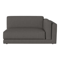 Gray fabric sofa with a modern, minimalist design and smooth texture, featuring a chic, solid pattern.