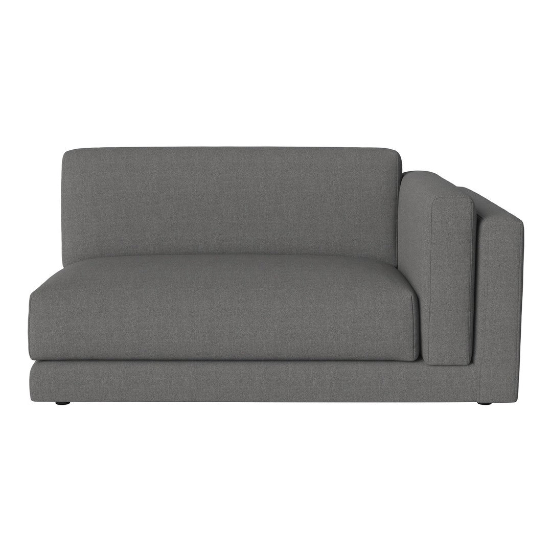 Gray upholstered sofa section with a smooth texture and minimalistic design. Perfect for modern decor.