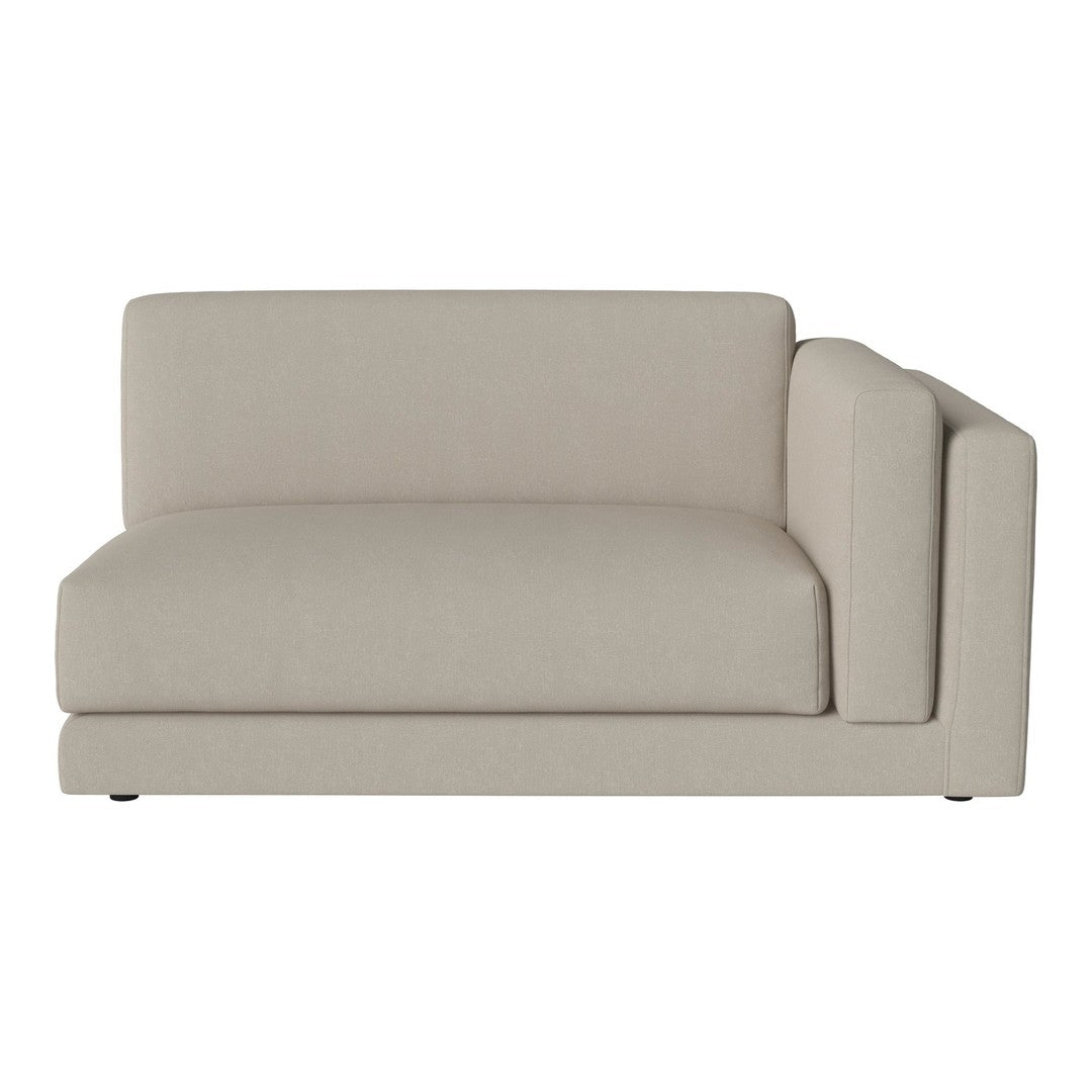 "Light beige sectional sofa with a smooth, plain fabric finish."