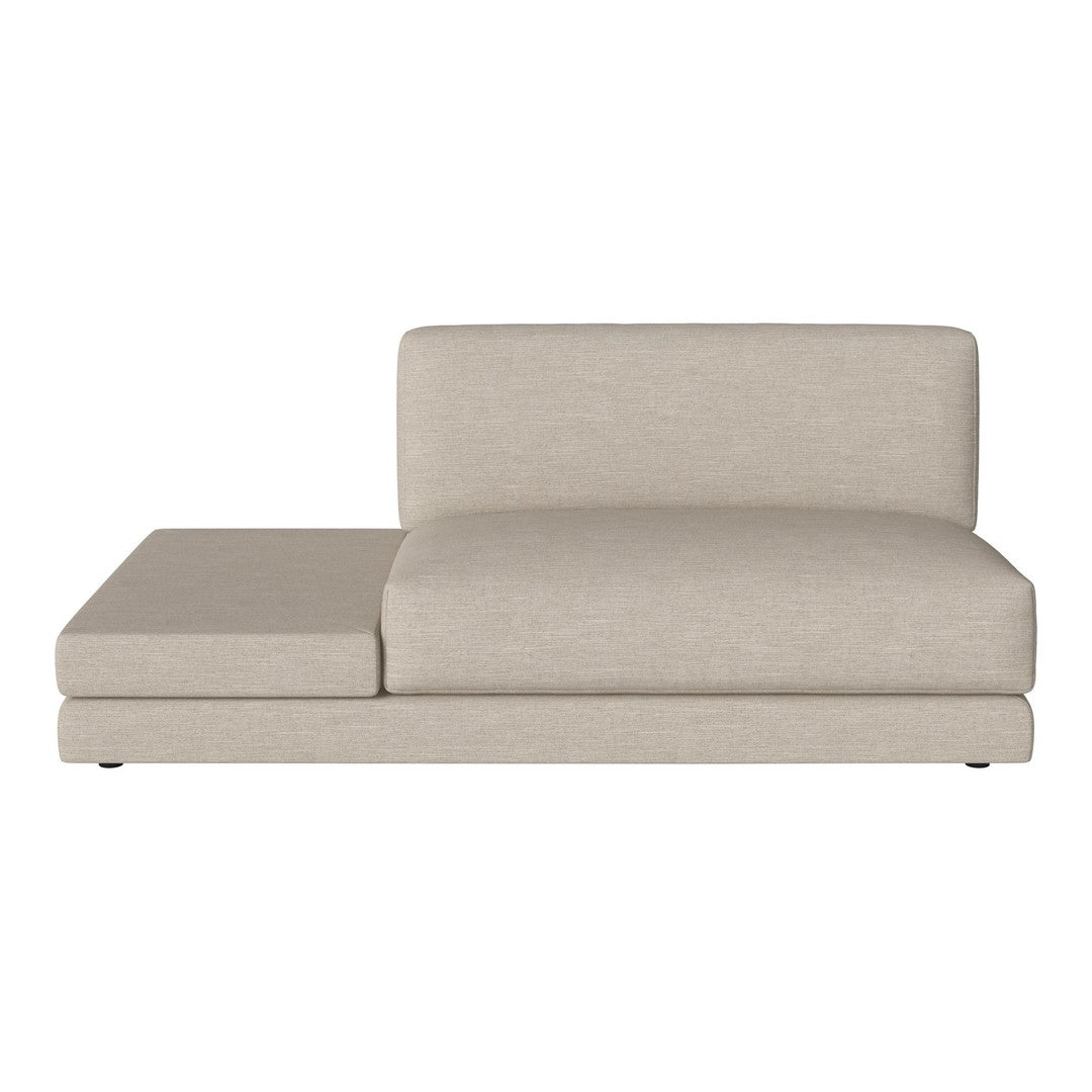 Beige upholstered sofa with a smooth, minimalist design and clean lines, perfect for modern living spaces.