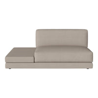 Beige modern chaise lounge with a smooth, minimalist design and soft texture, perfect for contemporary interiors.
