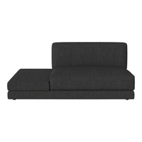 Gray upholstered sectional sofa with a smooth, sleek design, featuring a subtle, textured fabric pattern.