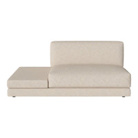 Beige upholstered chaise lounge with a smooth, minimalist design for modern decor.