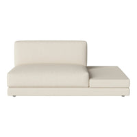 Modern cream chaise lounge with minimalistic design and smooth fabric, perfect for contemporary interiors.