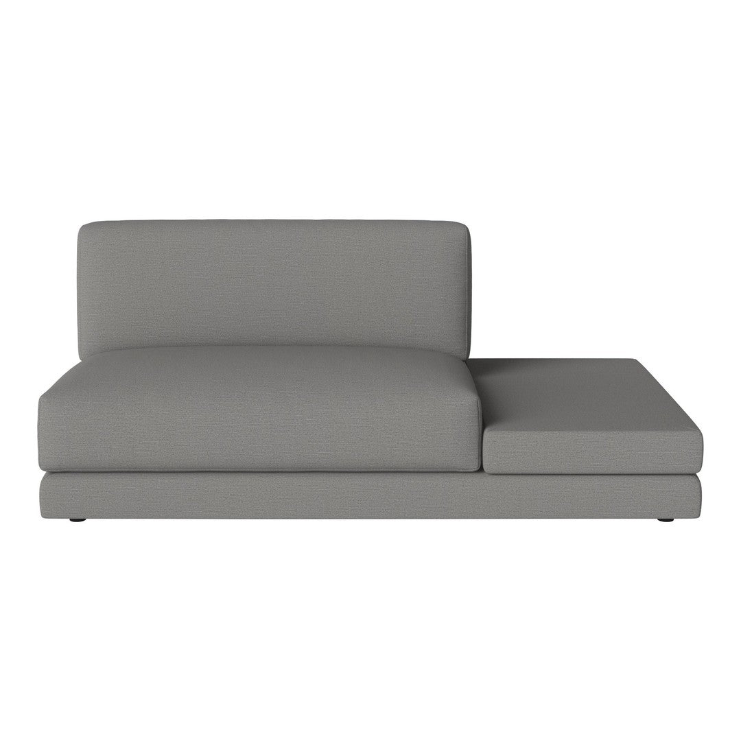 Gray modular sofa with a sleek, minimalist design and solid fabric pattern, perfect for modern living spaces.