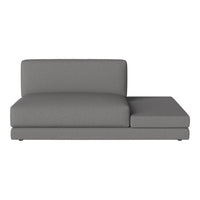Gray sectional sofa with a smooth, modern design and minimalistic pattern, perfect for contemporary living spaces.