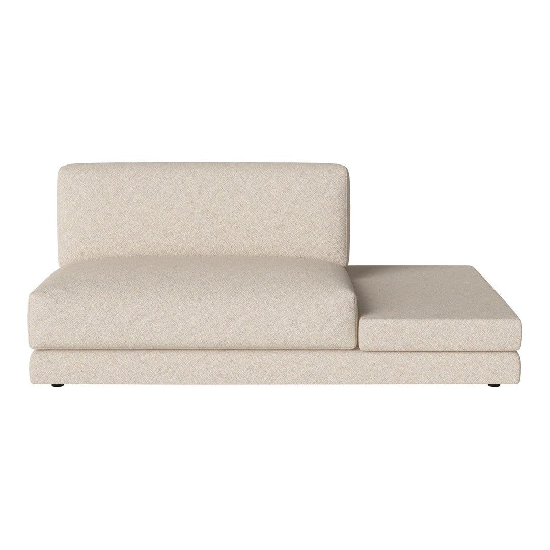 Light beige chaise lounge with a smooth texture and minimalist design, ideal for modern interiors.
