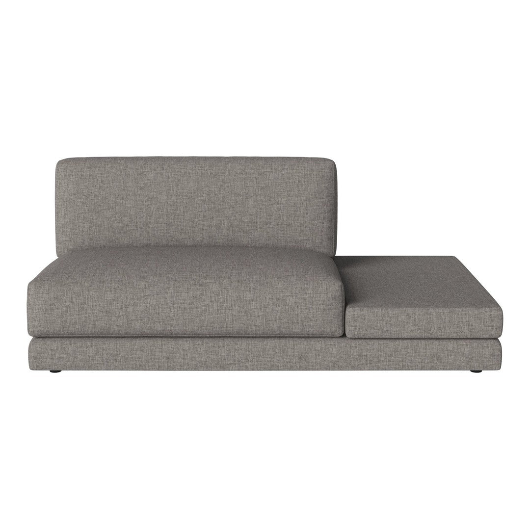 Gray upholstered chaise lounge with a textured fabric and minimalist design. Perfect for modern living spaces.