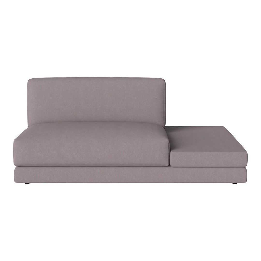 Gray sectional sofa with a sleek, minimalist design and smooth upholstery. Ideal for modern living spaces.